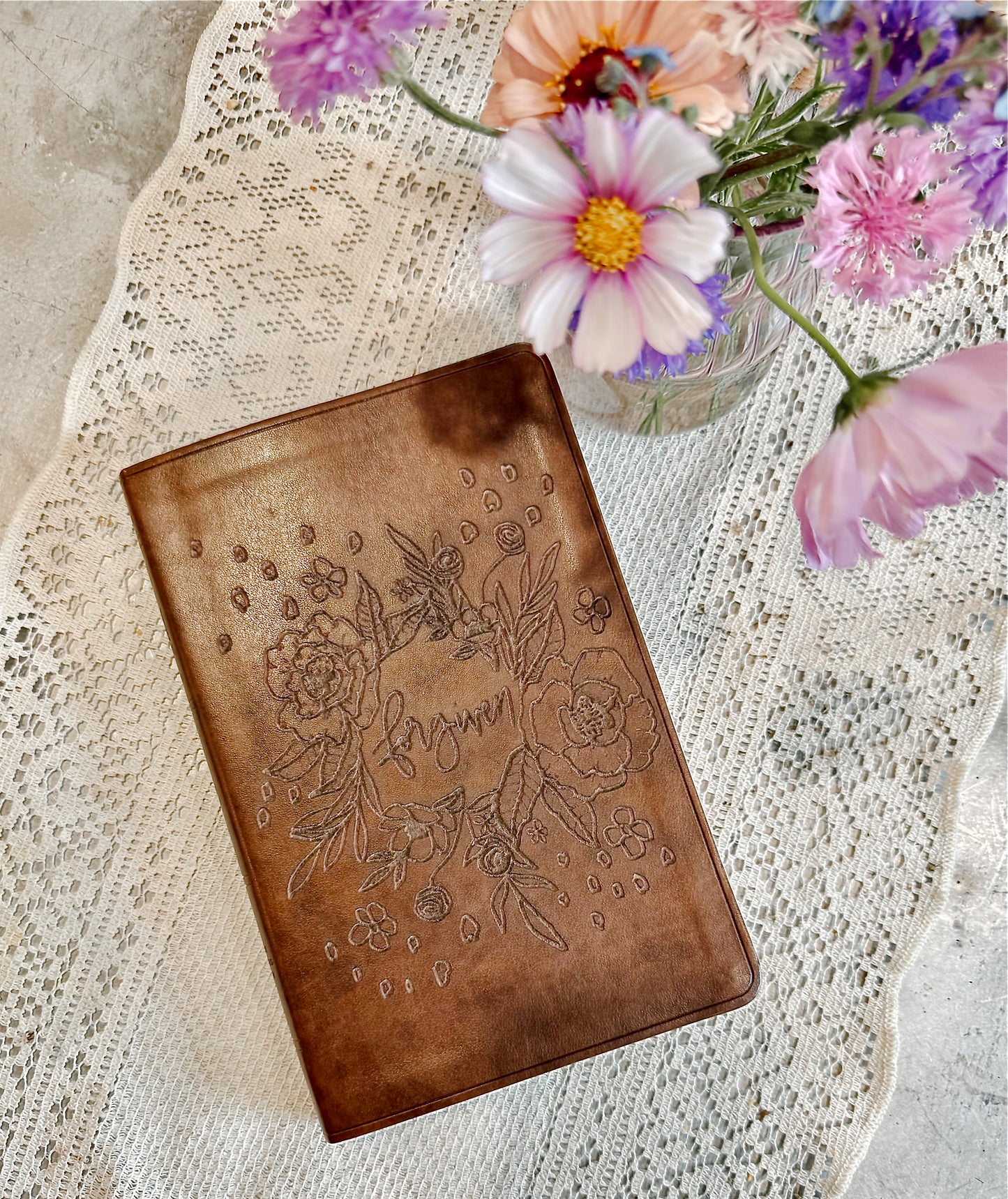 Forgiven floral engraved faux leather ESV bible