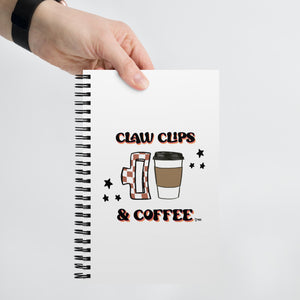 Claw clips and coffee spiral notebook